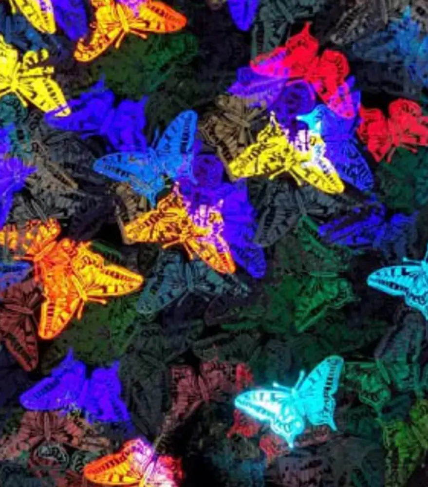 UV-reactive holographic butterfly pattern